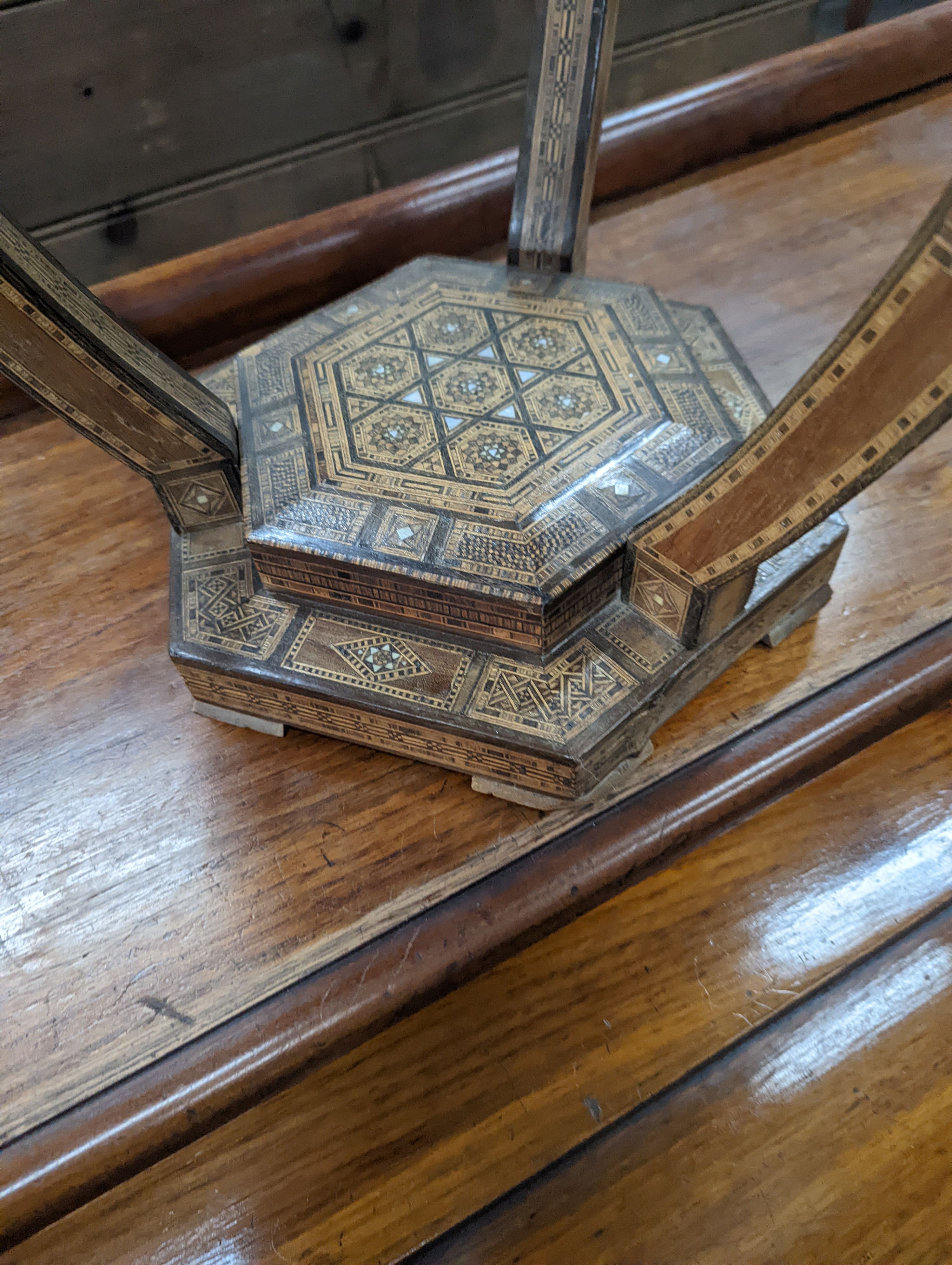 A Moorish bone and parquetry inlaid two tier occasional table, diameter 41cm, height 52cm